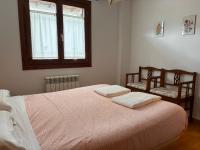 A bed or beds in a room at BPIRINEOS-Las Plazas