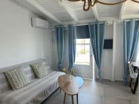 Posteľ alebo postele v izbe v ubytovaní Myrtos Cosy Apartments