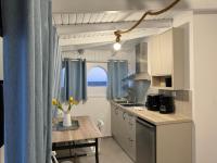 Kuchyňa alebo kuchynka v ubytovaní Myrtos Cosy Apartments