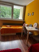 Postel nebo postele na pokoji v ubytování Travel House Wroclaw
