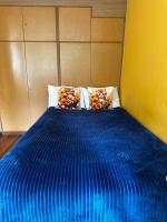 Postel nebo postele na pokoji v ubytování Travel House Wroclaw