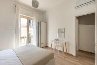 Posteľ alebo postele v izbe v ubytovaní Sant'Agostino Apartment with Terrace by Wonderful Italy