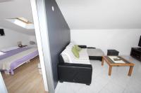 Postel nebo postele na pokoji v ubytování Rooms and Apartment Luana