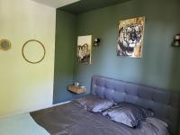 Ein Bett oder Betten in einem Zimmer der Unterkunft Appartement R&eacute;sidence Villeneuve