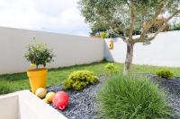 Vonkajšia záhrada v ubytovaní Superbe maison de vacances entre plage et marais - 7 pers