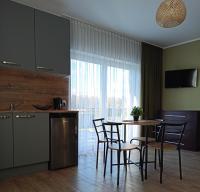 Kuchnia lub aneks kuchenny w obiekcie Flauta Apartamenty Rodzinne
