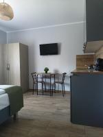Kuchnia lub aneks kuchenny w obiekcie Flauta Apartamenty Rodzinne