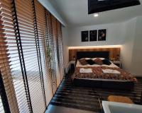 Łóżko lub łóżka w pokoju w obiekcie Apartament DREAM