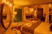 Postel nebo postele na pokoji v ubytování Carmin Cave Hotel