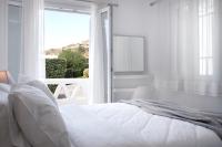Posteľ alebo postele v izbe v ubytovaní Baos Pool Villas
