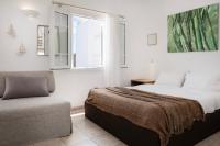 Posteľ alebo postele v izbe v ubytovaní Baos Pool Villas