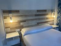 A bed or beds in a room at SANTA PAULA CENTRO JUNTO CATEDRAL center