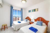 Posteľ alebo postele v izbe v ubytovaní Villa Arco Iris by Villa Plus