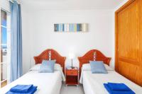 Posteľ alebo postele v izbe v ubytovaní Villa Arco Iris by Villa Plus