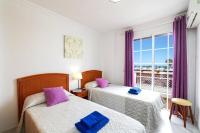 Posteľ alebo postele v izbe v ubytovaní Villa Arco Iris by Villa Plus