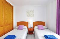 Posteľ alebo postele v izbe v ubytovaní Villa Arco Iris by Villa Plus