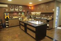 Una cocina o cocineta en eSuites Sorocaba