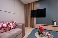 TV a/nebo společenská místnost v ubytování Villa Providenca Annex