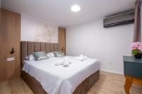 Postel nebo postele na pokoji v ubytování Villa Providenca Annex