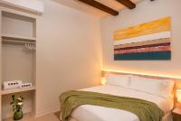 Posteľ alebo postele v izbe v ubytovaní Coeo Fresca Design Apartments