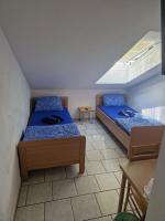 En eller flere senge i et værelse på Erbacher Hof