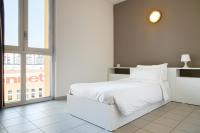 Posteľ alebo postele v izbe v ubytovaní Hotel Campus Sanpaolo