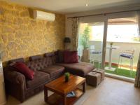 A seating area at Apartamento Atico Duplex de 1 dorm en Tarifa