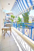 A balcony or terrace at LOVELY AND SUNNY APARTAMENT 300m FROM BEACH!!