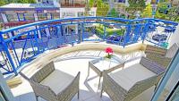 A balcony or terrace at LOVELY AND SUNNY APARTAMENT 300m FROM BEACH!!