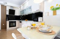 Kuchyňa alebo kuchynka v ubytovaní Premium apartment ALBA ROSA