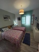 Postel nebo postele na pokoji v ubytování Apartamento Sofia Los Cristianos