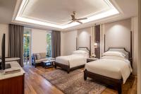 Ein Bett oder Betten in einem Zimmer der Unterkunft The Danna Langkawi - A Member of Small Luxury Hotels of the World