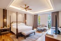Ein Bett oder Betten in einem Zimmer der Unterkunft The Danna Langkawi - A Member of Small Luxury Hotels of the World