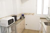 Kuchyň nebo kuchyňský kout v ubytování Apartamenticos Plaza Las Armas