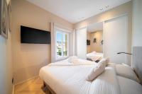 Łóżko lub łóżka w pokoju w obiekcie REF 1466 - Cannes Back Croisette - Penthouse for rent