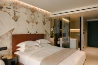 Casaly Hotel & Spaにあるベッド