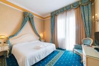 Posteľ alebo postele v izbe v ubytovaní Hotel Terme Helvetia