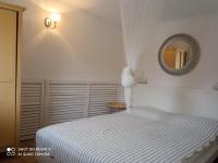 Postel nebo postele na pokoji v ubytování Holiday Homes Mare