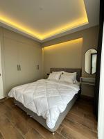 Postel nebo postele na pokoji v ubytování Vista Living Apartments