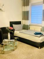 Postel nebo postele na pokoji v ubytování KriDa Comfort Ferienwohnung