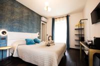 Posteľ alebo postele v izbe v ubytovaní Bellevue - Rooms & Suites