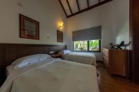Een bed of bedden in een kamer bij BuBu Villa