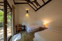 Een bed of bedden in een kamer bij BuBu Villa