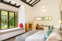 Een bed of bedden in een kamer bij BuBu Villa