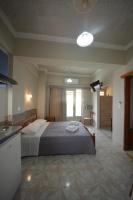 Posteľ alebo postele v izbe v ubytovaní Bikakis Family Apartments