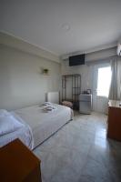 Posteľ alebo postele v izbe v ubytovaní Bikakis Family Apartments