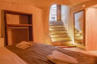Postel nebo postele na pokoji v ubytování Carmin Cave Hotel