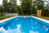 Bazén v ubytovaní Aristotelia Gi Ikies - Olympiada Poolside Retreats alebo v jeho blízkosti