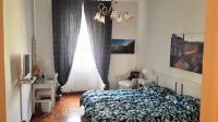 A bed or beds in a room at CiaoRoma!