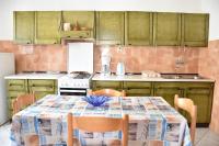 Kuchyňa alebo kuchynka v ubytovaní Apartman Miki